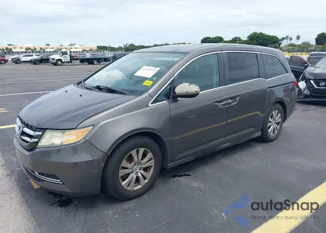 2014 Honda Odyssey Ex-L z USA, uszkodzony, nr VIN 5FNRL5H65EB003909